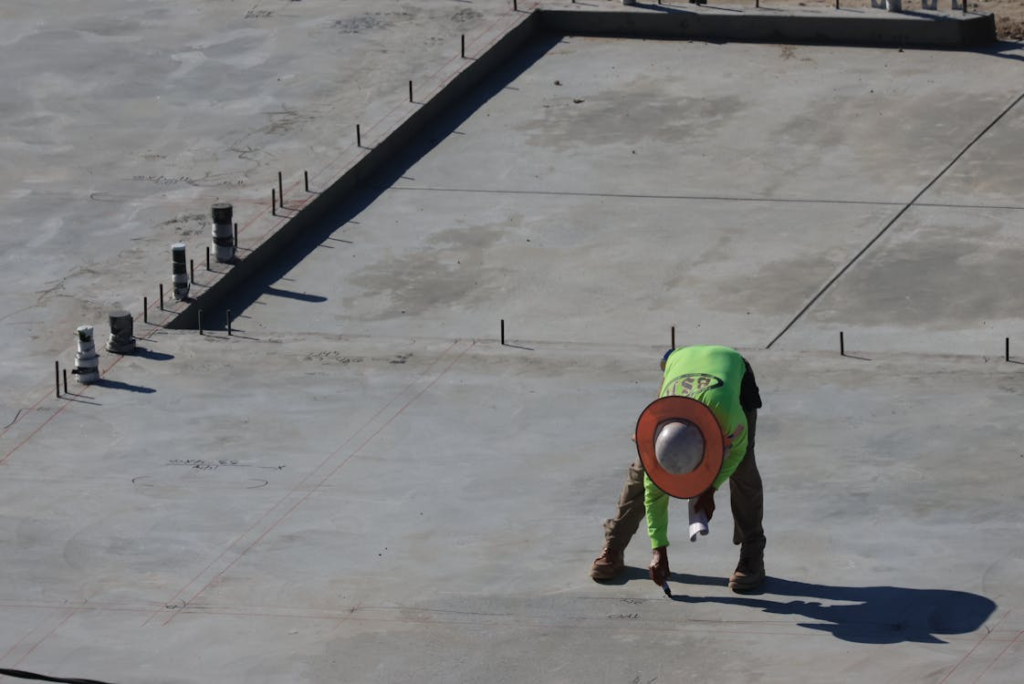 An image of a roofer working on a roof
