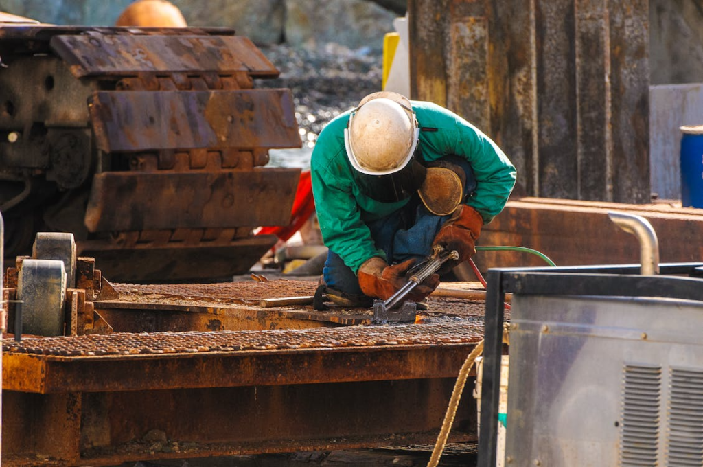 An image of a roofer working on a roof