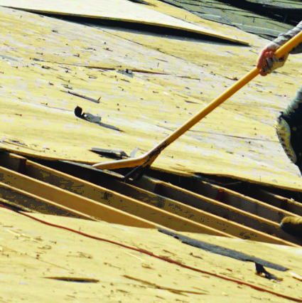 EPDM rubber roofing installation on a commercial building, showing flexible membrane application