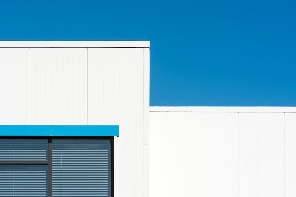 An image of a white commercial building