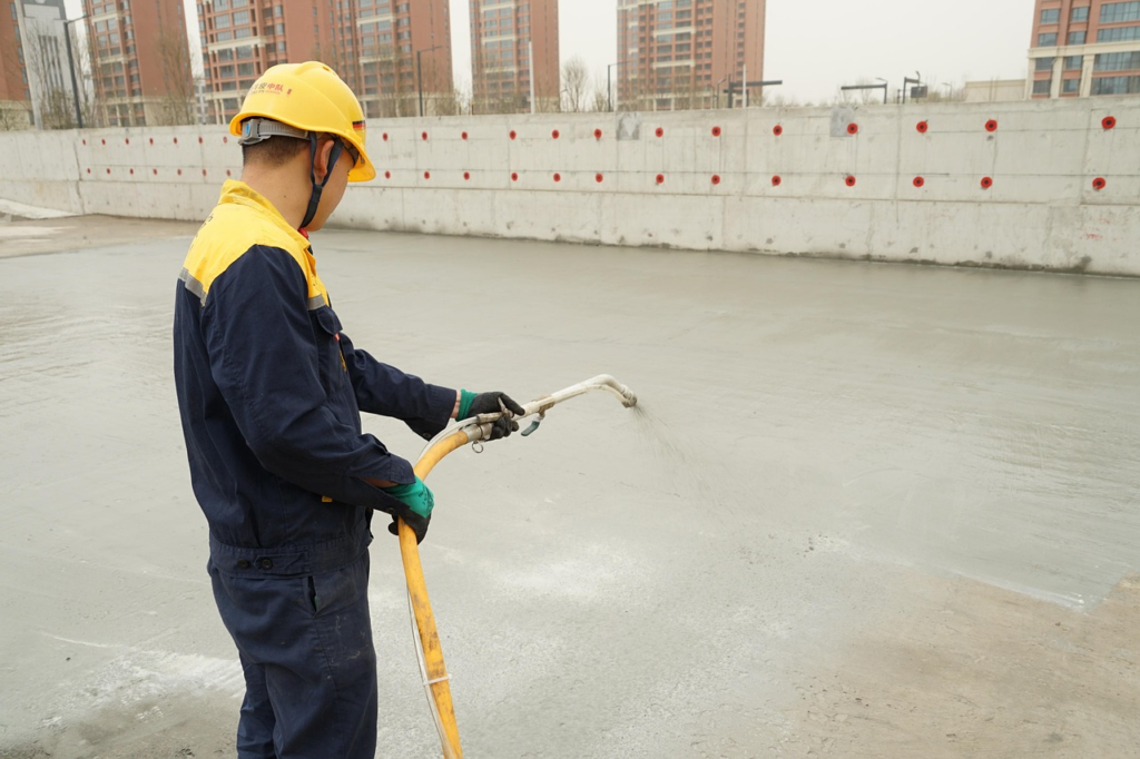 close-up of a worker cleaning up a roof
