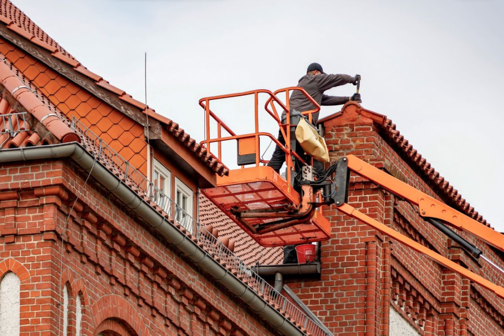 A roofer working on a roof