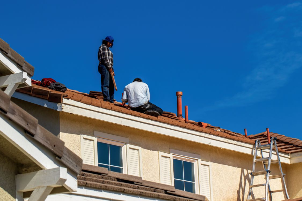 Roofers working on a roof