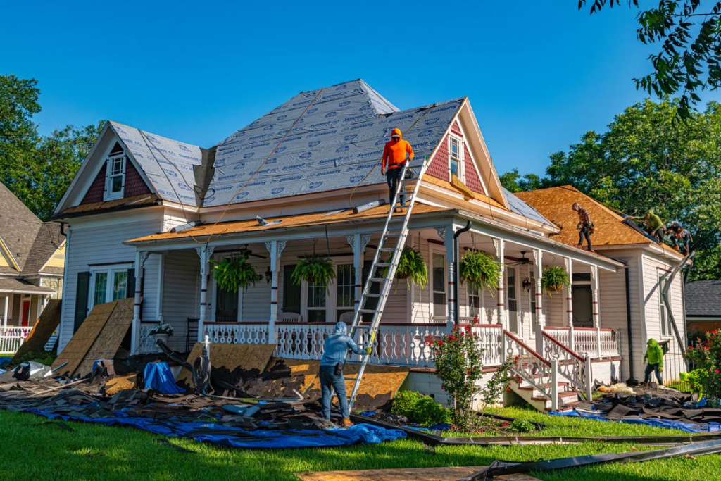 Roofers working on a roof